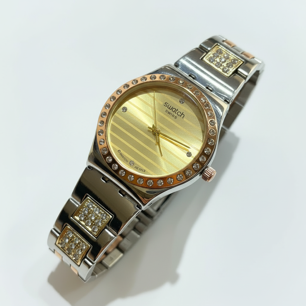 Swatch Gold Crystal Stripes – L’Éclat Doré au Style Contemporain